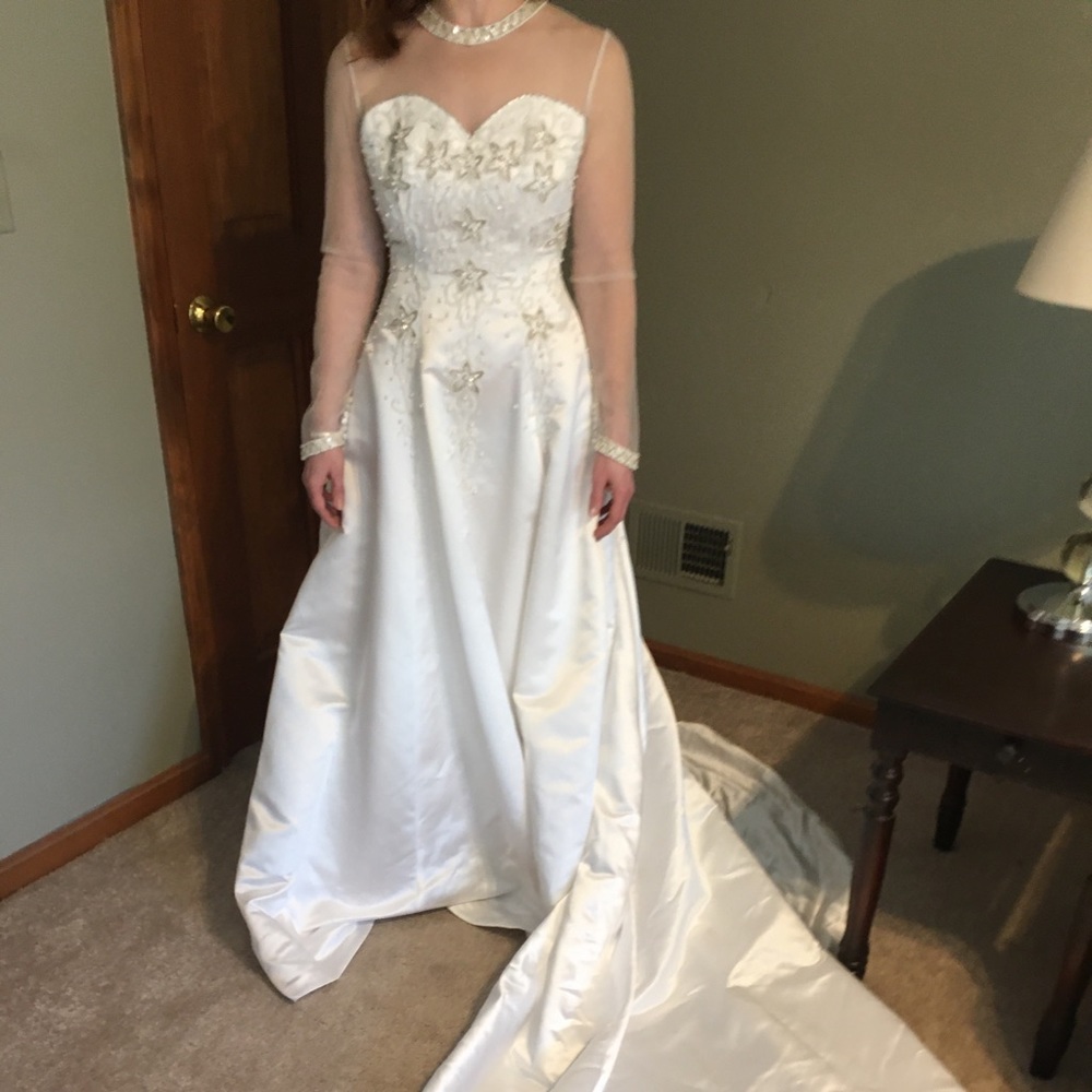Long sleeve white satin wedding dress